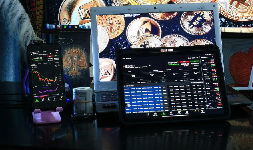 How do game developers fund their projects, and where does the money come from?
